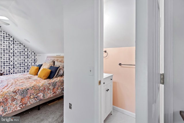bedroom with lofted ceiling