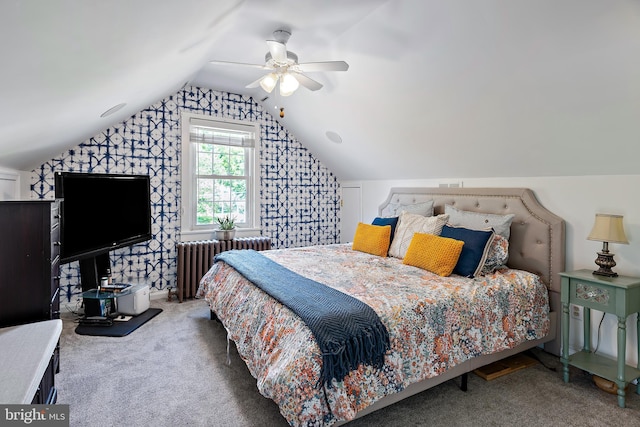 carpeted bedroom with a ceiling fan, radiator heating unit, and lofted ceiling