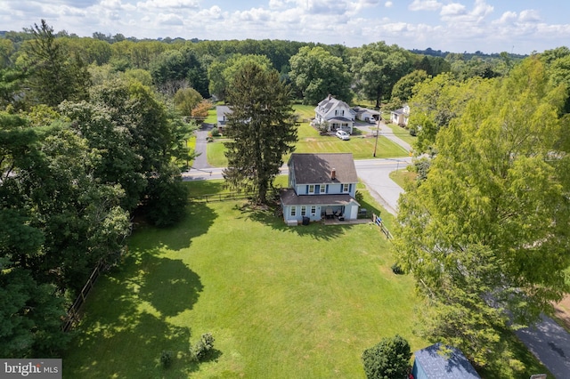 bird's eye view featuring a forest view