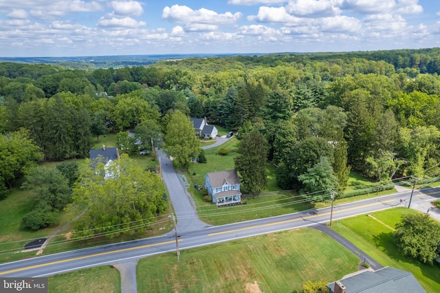 aerial view featuring a view of trees
