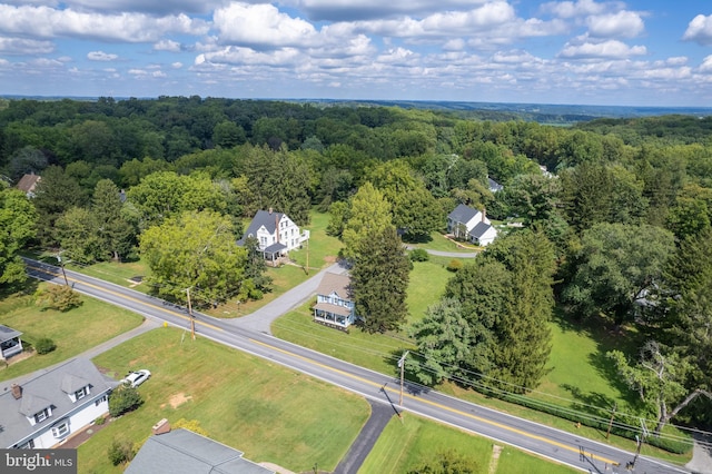 aerial view featuring a forest view