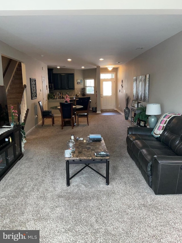 7805 Wistar Woods Pl, Henrico, VA 23228 - carpeted living area with baseboards, recessed lighting, and stairs