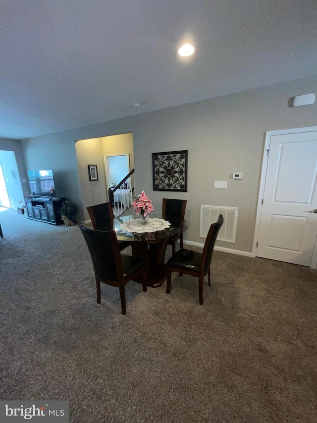 7805 Wistar Woods Pl, Henrico, VA 23228 - dining space with visible vents, carpet, and baseboards