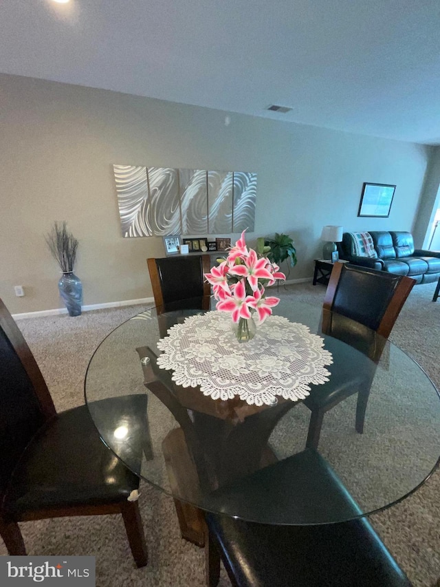 7805 Wistar Woods Pl, Henrico, VA 23228 - dining space featuring carpet and baseboards
