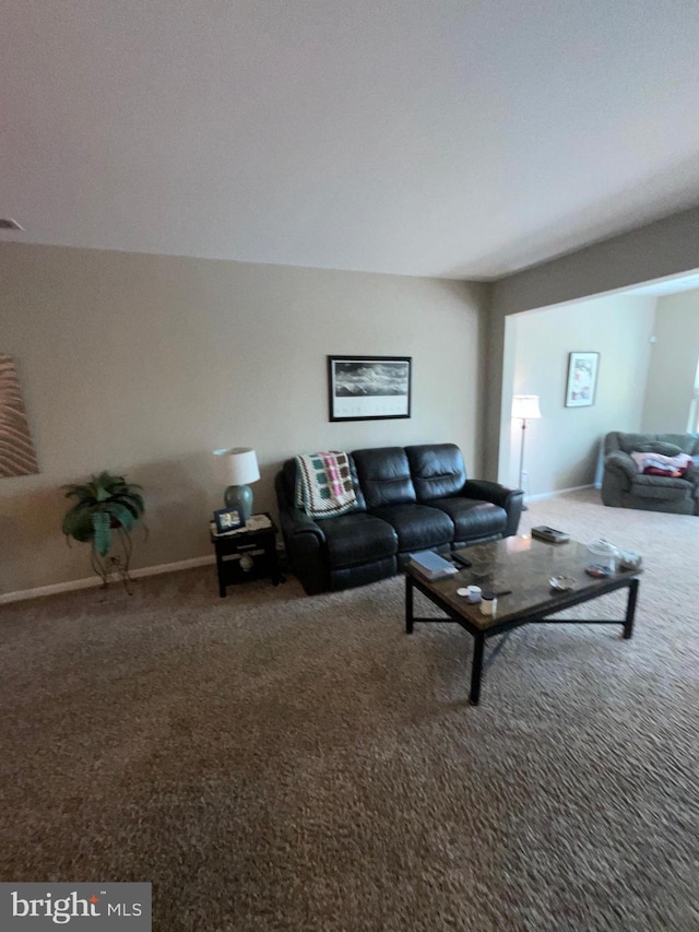 7805 Wistar Woods Pl, Henrico, VA 23228 - carpeted living area featuring baseboards