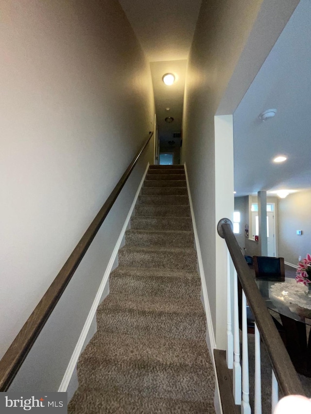 7805 Wistar Woods Pl, Henrico, VA 23228 - staircase with baseboards and carpet floors