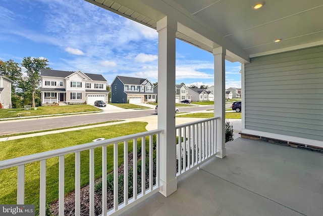 balcony with a residential view and covered porch