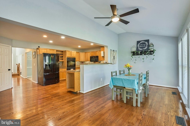 dining area featuring wood finished floors, recessed lighting, ceiling fan, and lofted ceiling