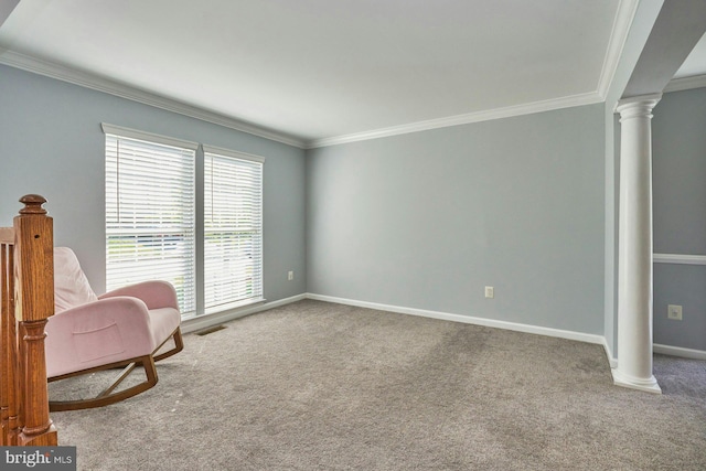 living area featuring crown molding, visible vents, baseboards, ornate columns, and carpet flooring