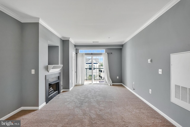 unfurnished living room featuring a heating unit, baseboards, carpet, a fireplace, and ornamental molding