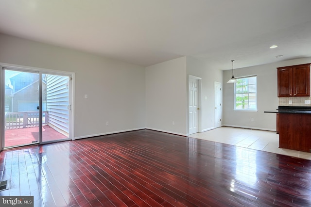 724 Tinker Rd, Middle River, MD 21220 - unfurnished living room with light wood finished floors, baseboards, and recessed lighting