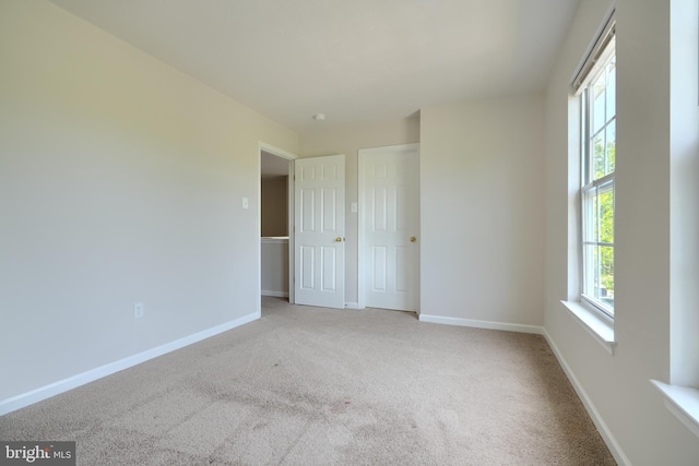 724 Tinker Rd, Middle River, MD 21220 - unfurnished bedroom with carpet floors and baseboards