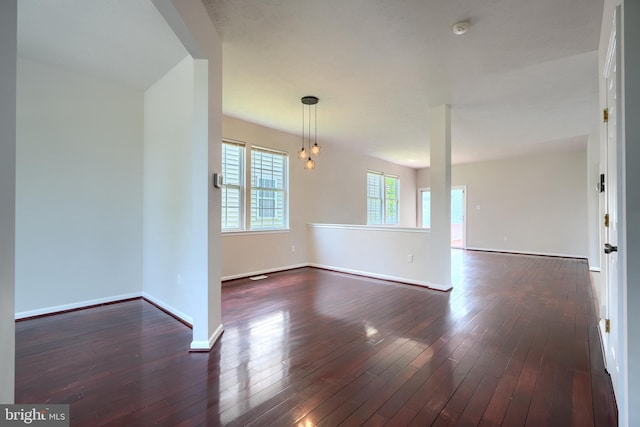 724 Tinker Rd, Middle River, MD 21220 - empty room with a smoke detector, baseboards, and dark wood-style floors