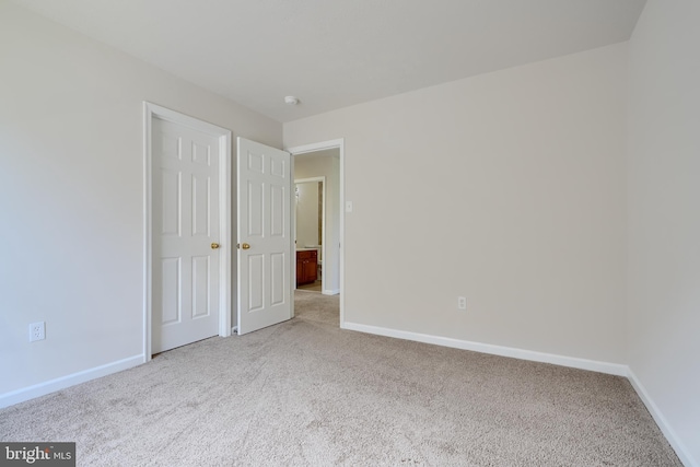 724 Tinker Rd, Middle River, MD 21220 - unfurnished bedroom featuring carpet and baseboards