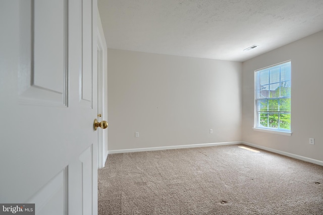 724 Tinker Rd, Middle River, MD 21220 - carpeted spare room featuring baseboards and a textured ceiling