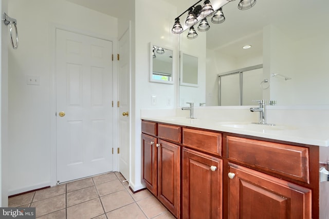 724 Tinker Rd, Middle River, MD 21220 - bathroom with double vanity, tile patterned flooring, and a stall shower