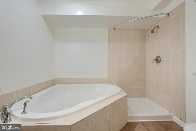 724 Tinker Rd, Middle River, MD 21220 - full bath featuring a tub with jets, tiled shower, and tile patterned flooring