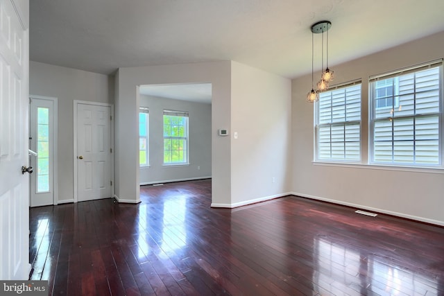 724 Tinker Rd, Middle River, MD 21220 - empty room featuring dark wood-style flooring and baseboards