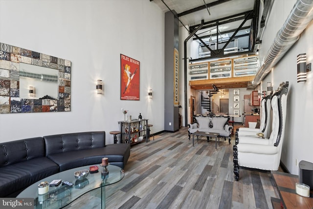 810 N Hancock St Unit 5, Philadelphia, PA 19123 - living room featuring a high ceiling and wood finished floors