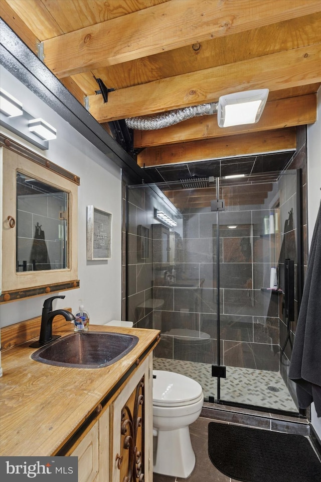 810 N Hancock St Unit 5, Philadelphia, PA 19123 - bathroom featuring vanity, a shower stall, and toilet