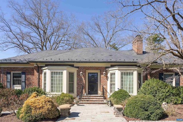 42 Old Farm Rd, Charlottesville, VA 22903 - view of front facade featuring brick siding and a chimney
