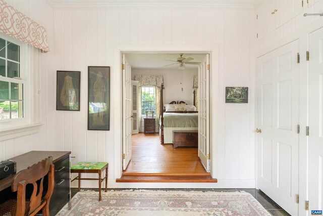 42 Old Farm Rd, Charlottesville, VA 22903 - hall featuring ornamental molding, a decorative wall, and wood finished floors