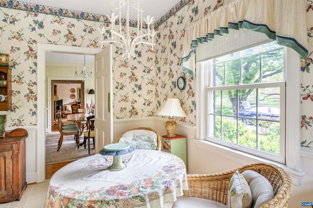 42 Old Farm Rd, Charlottesville, VA 22903 - dining space featuring light tile patterned floors, a wainscoted wall, a notable chandelier, and wallpapered walls