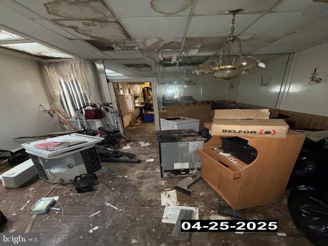 interior space with a drop ceiling