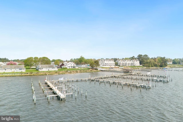 view of dock featuring boat lift and a water view