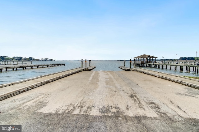 dock area featuring a gazebo and a water view
