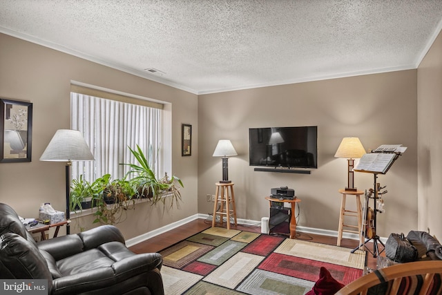 108 Shoreline Dr, Atco, NJ 08004 - living area with wood finished floors, a textured ceiling, baseboards, and ornamental molding