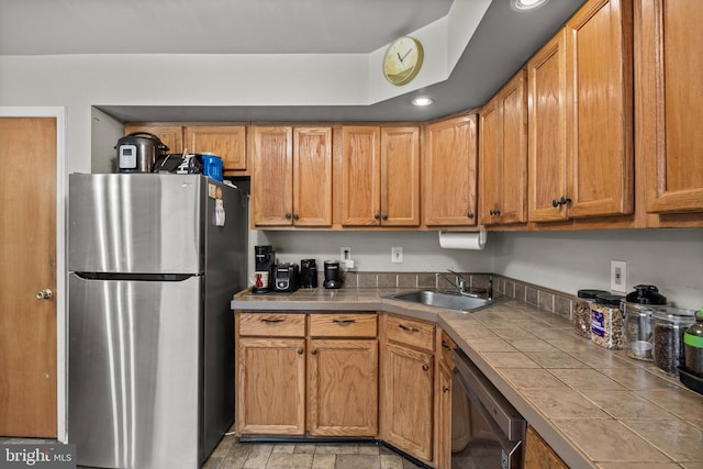 108 Shoreline Dr, Atco, NJ 08004 - kitchen with appliances with stainless steel finishes, tile countertops, a sink, and brown cabinets