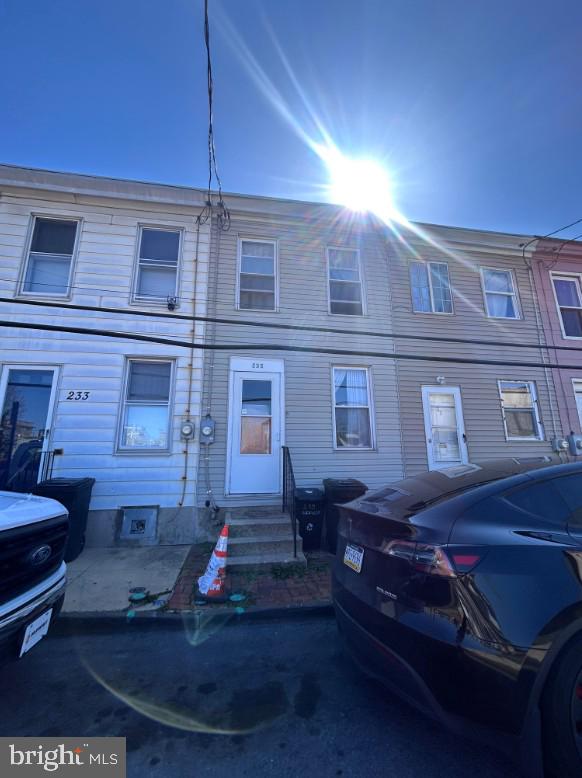 235 Maple St, Reading, PA 19602 - townhome / multi-family property featuring entry steps