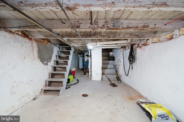 235 Maple St, Reading, PA 19602 - unfinished below grade area with water heater and stairs