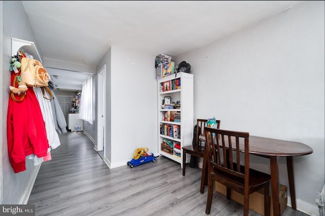 235 Maple St, Reading, PA 19602 - hall with baseboards and wood finished floors