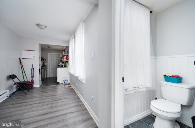 235 Maple St, Reading, PA 19602 - bathroom featuring wood finished floors and toilet