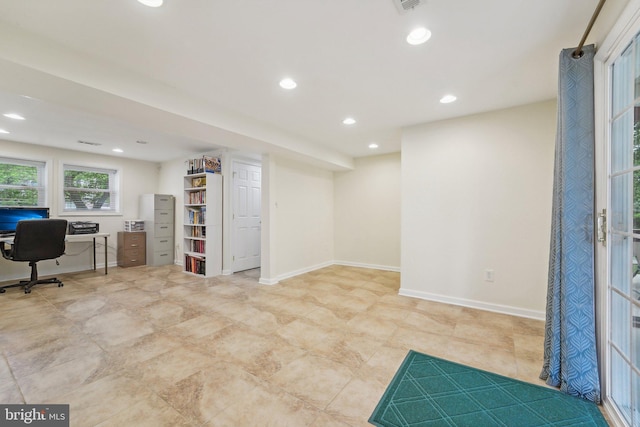 office space featuring recessed lighting and baseboards