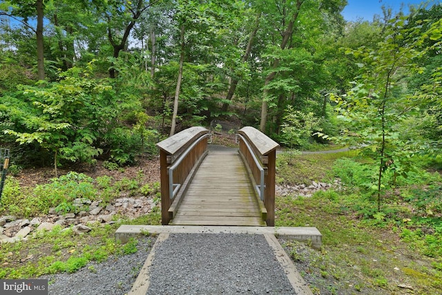 surrounding community with a forest view