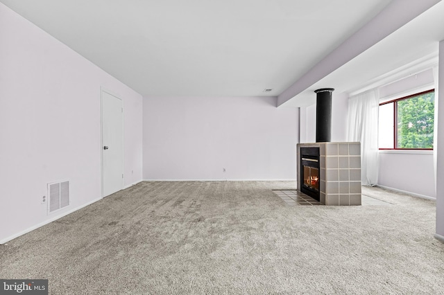 8004 Valley Manor Rd Unit 3C, Owings Mills, MD 21117 - unfurnished living room with carpet floors, baseboards, and visible vents