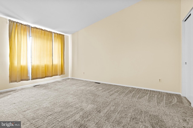 8004 Valley Manor Rd Unit 3C, Owings Mills, MD 21117 - carpeted empty room featuring baseboards and visible vents