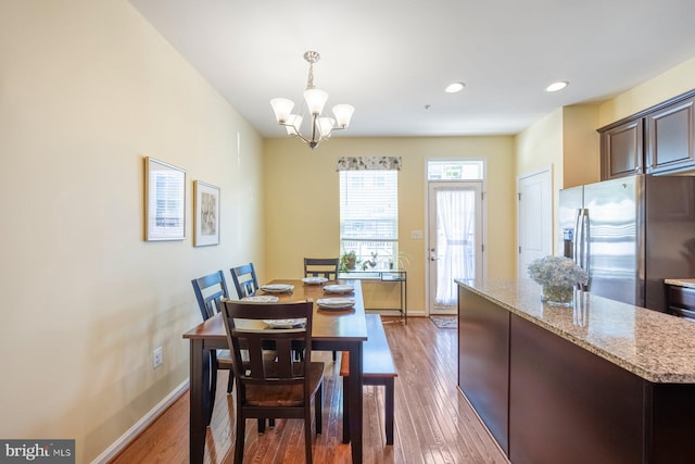748 S Macon St, Baltimore, MD 21224 - dining space with baseboards, a chandelier, light wood finished floors, and recessed lighting