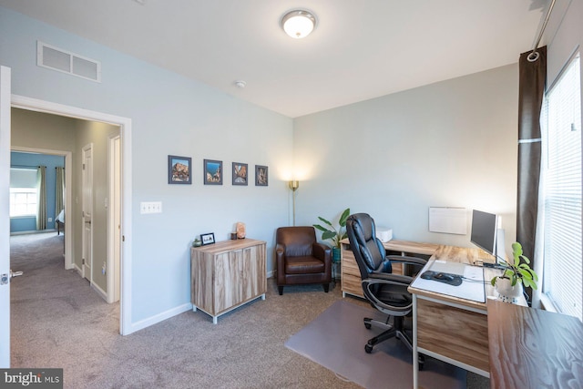 748 S Macon St, Baltimore, MD 21224 - office area featuring carpet floors and baseboards