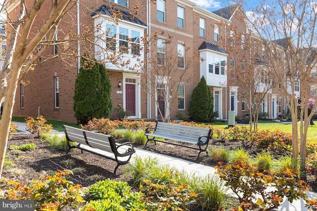 748 S Macon St, Baltimore, MD 21224 - view of front of property featuring brick siding and a residential view