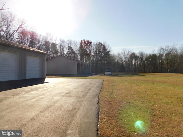 view of street with aphalt driveway