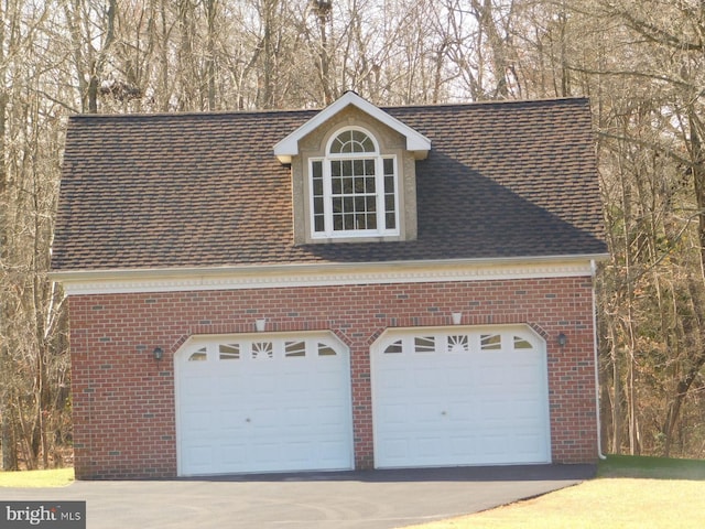 garage with driveway