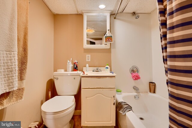 4315 Washington Blvd, Halethorpe, MD 21227 - bathroom featuring toilet, shower / bath combination with curtain, vanity, and a drop ceiling