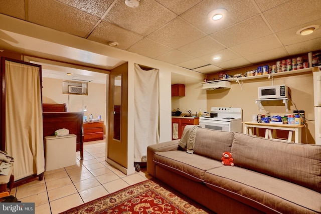 4315 Washington Blvd, Halethorpe, MD 21227 - living area featuring light tile patterned floors, a drop ceiling, a wall mounted AC, and recessed lighting