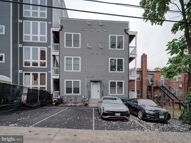 2109 M St NE Unit 5, Washington, DC 20002 - back of property featuring uncovered parking and entry steps