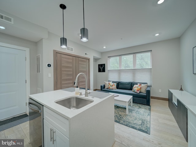 2109 M St NE Unit 5, Washington, DC 20002 - kitchen with a sink, light countertops, dishwasher, open floor plan, and recessed lighting