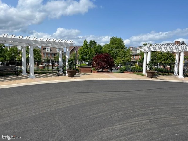 exterior space featuring a pergola